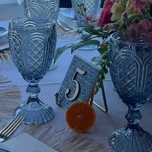 Blue tile table numbers 1-8 with gold stands